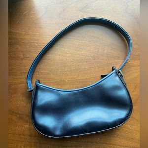 Black faux leather mini purse.